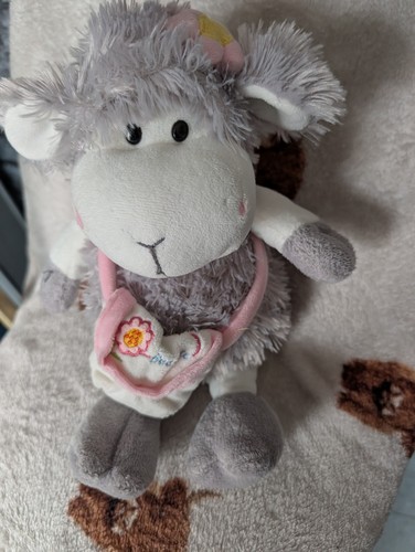Cuddles time fluffy grey sheep - cuddles,